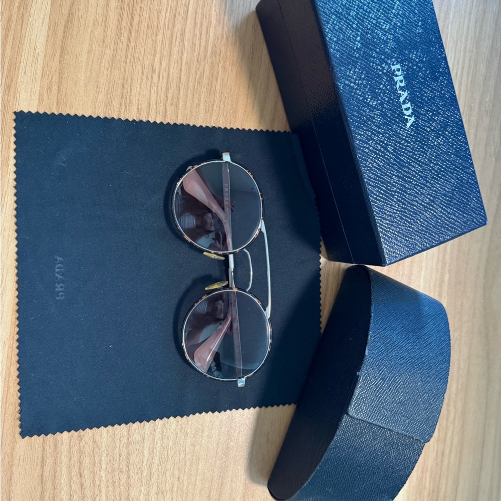 Prada Sunglasses with Black and Gold Detailing